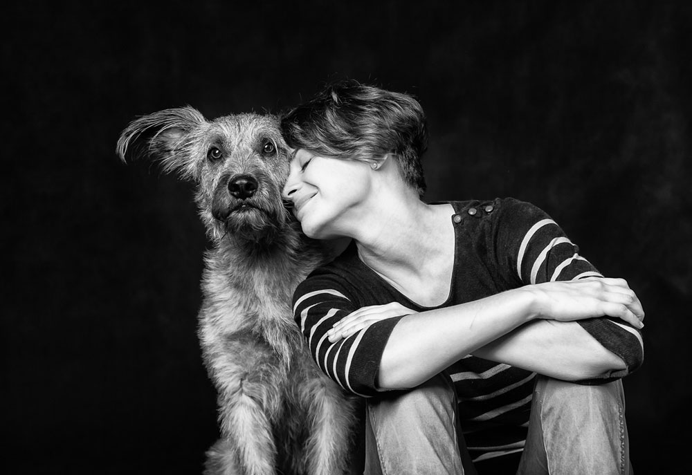 Picture of Scruffy Dog and a Woman | Black and White Photography