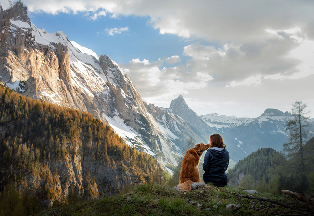 Dog and Woman in Mountain Landscape | Dog Photography Pictures